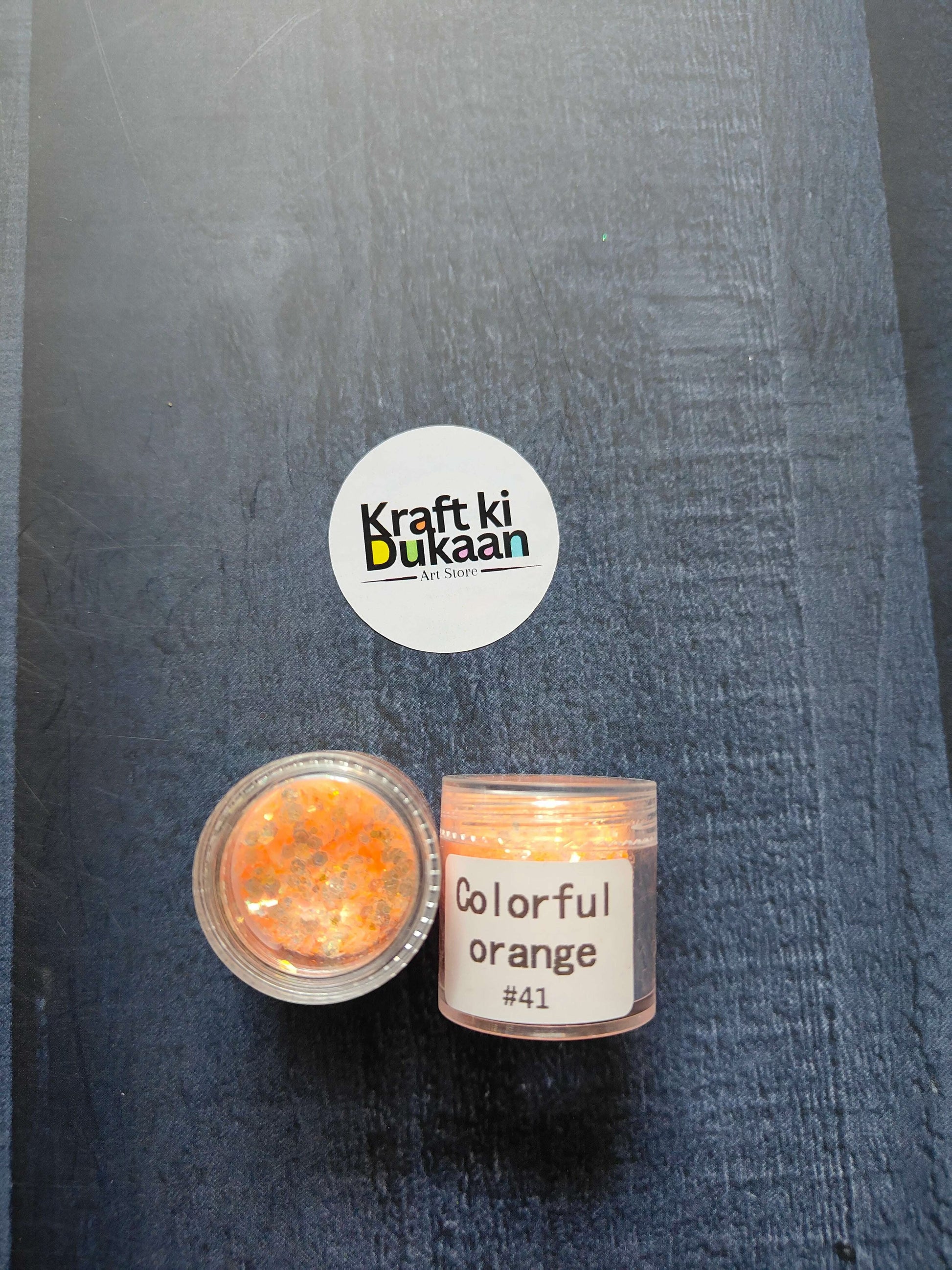 Shimmer glitter in Colorful orange, jar with label #41 visible