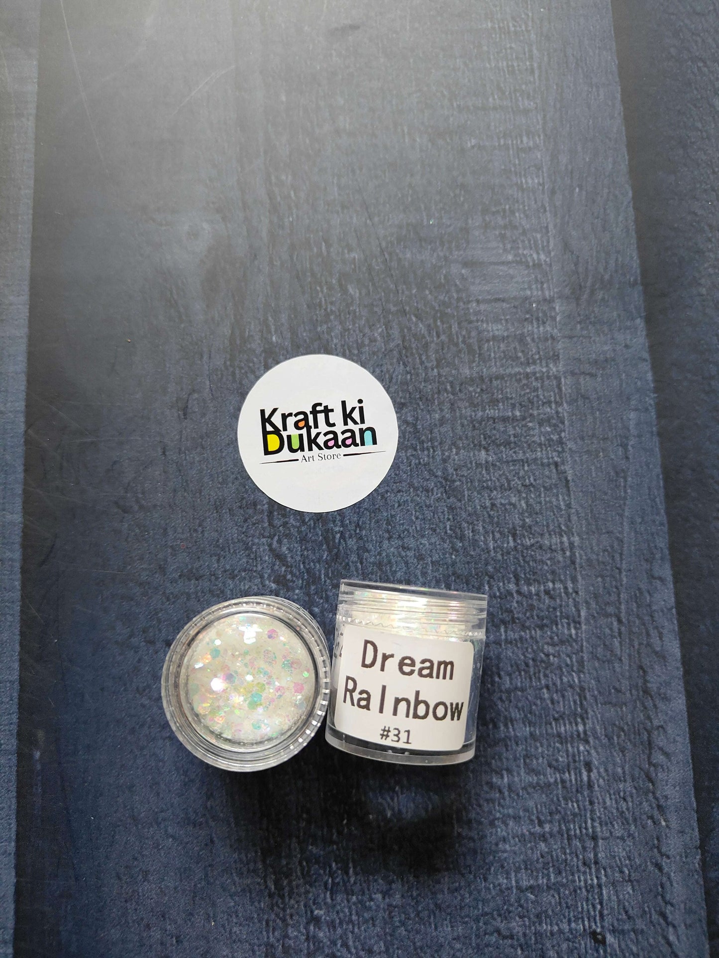 Shimmer glitter in Dream Rainbow, jar with label #31 visible