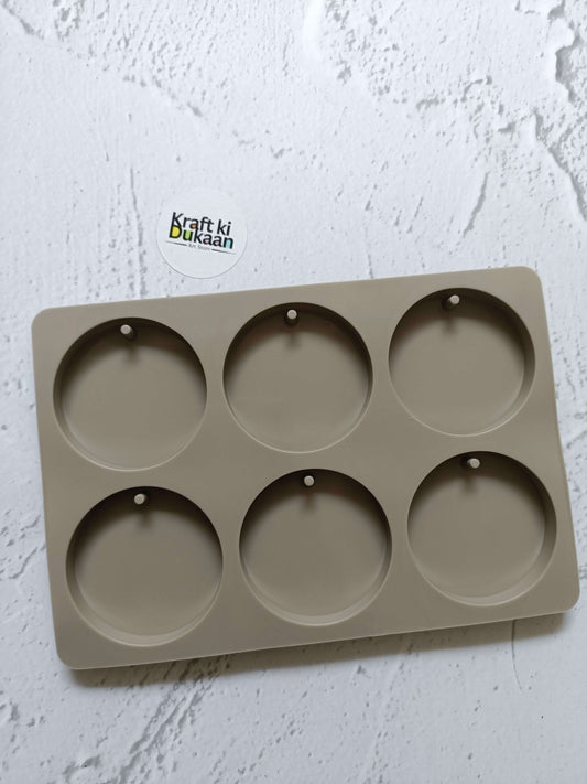 6 cavity round sachet mould with six circular cavities on a rectangular base
