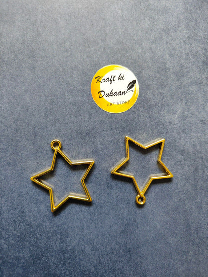 Gold star bezel pendant charms, two-piece view with loop at top