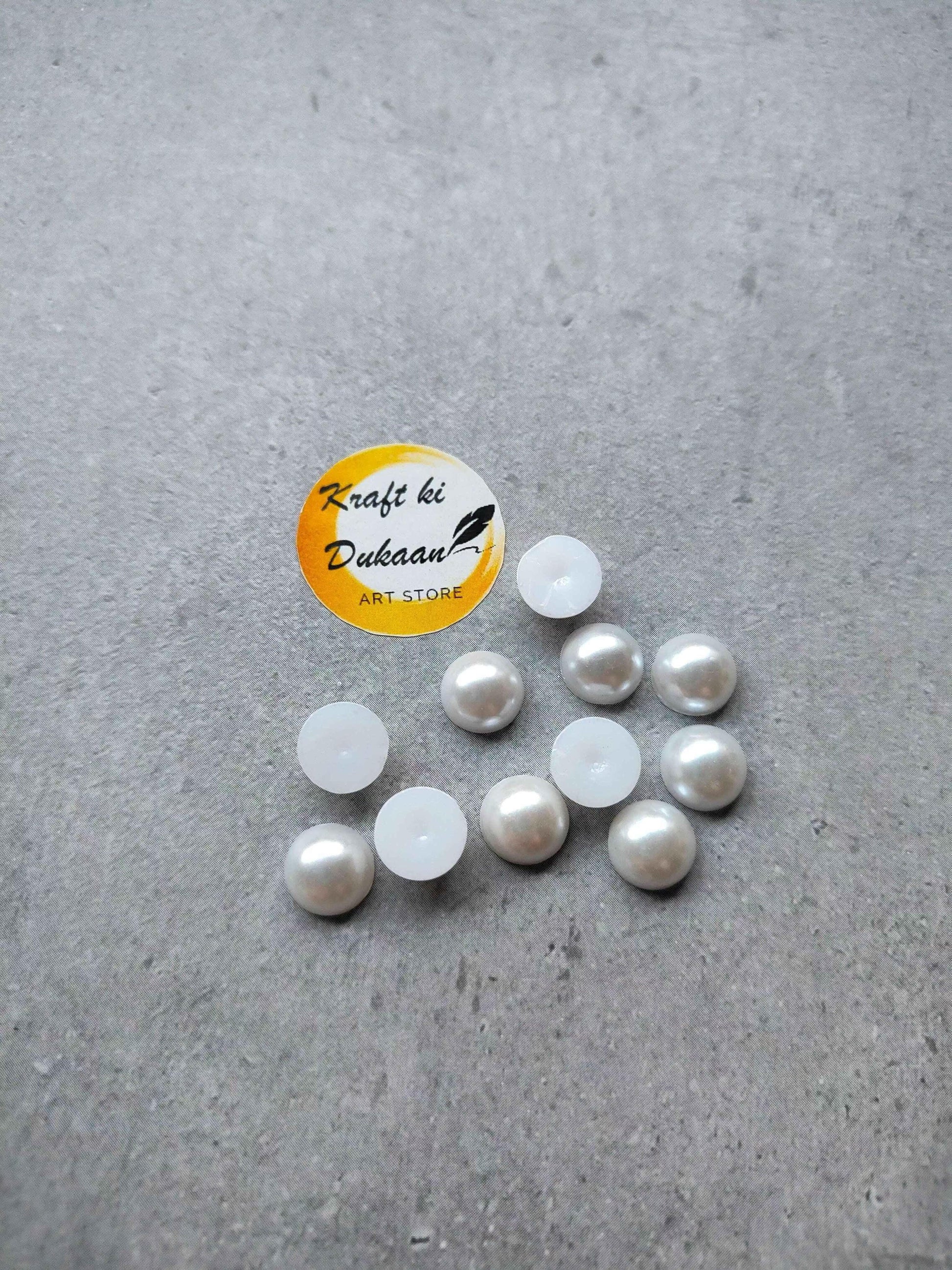 Mixed white and translucent half-round pearl beads, small round pieces