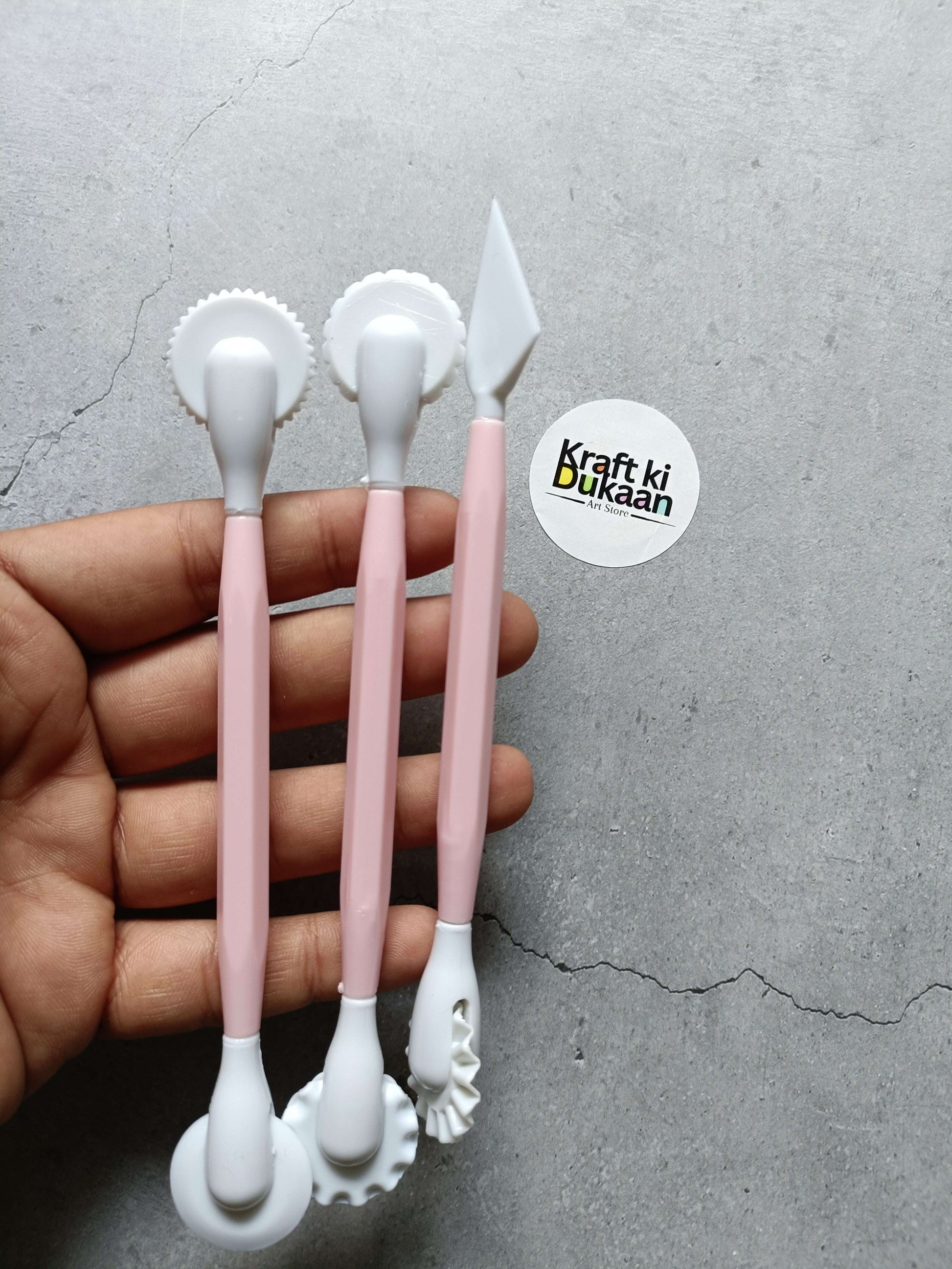 3PC plastic clay tools held in hand—two rounded heads and one triangular tip
