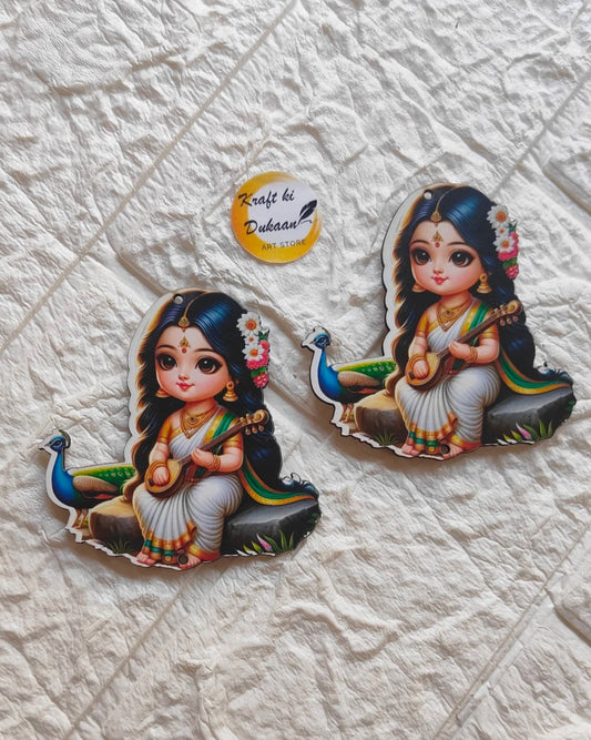 Kraft ki Dukaan 3 inch MDF figure of a girl in traditional attire sitting with a peacock on textured white background