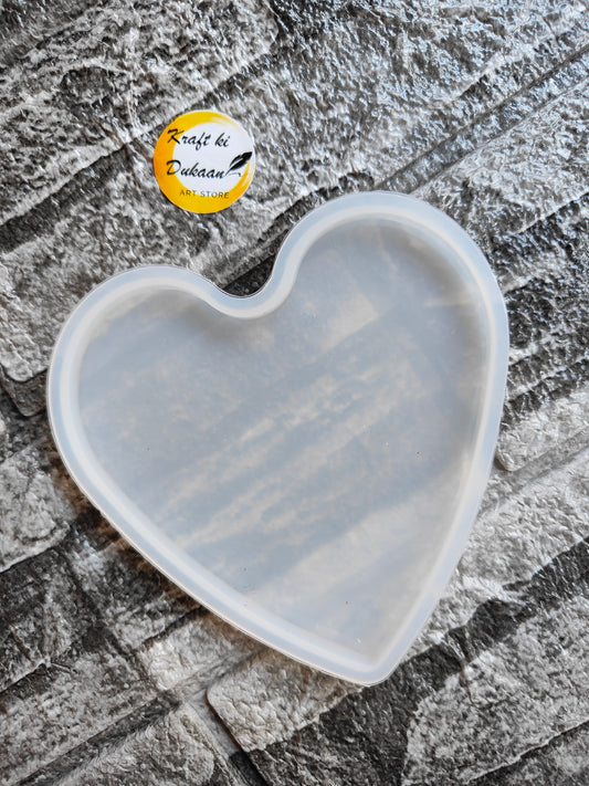 Transparent 4 inch heart silicone mold by Kraft ki Dukaan on textured background