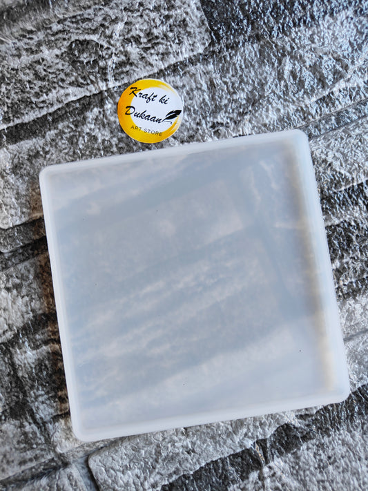 4 inch square resin mold by Kraft ki Dukaan on textured stone background for crafting projects