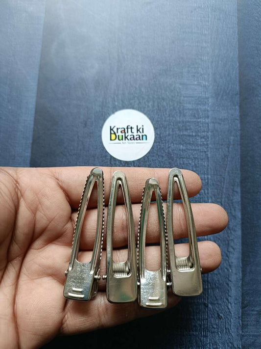 6.5cm silver metal hair clips, set of 5; hinged clips shown in hand