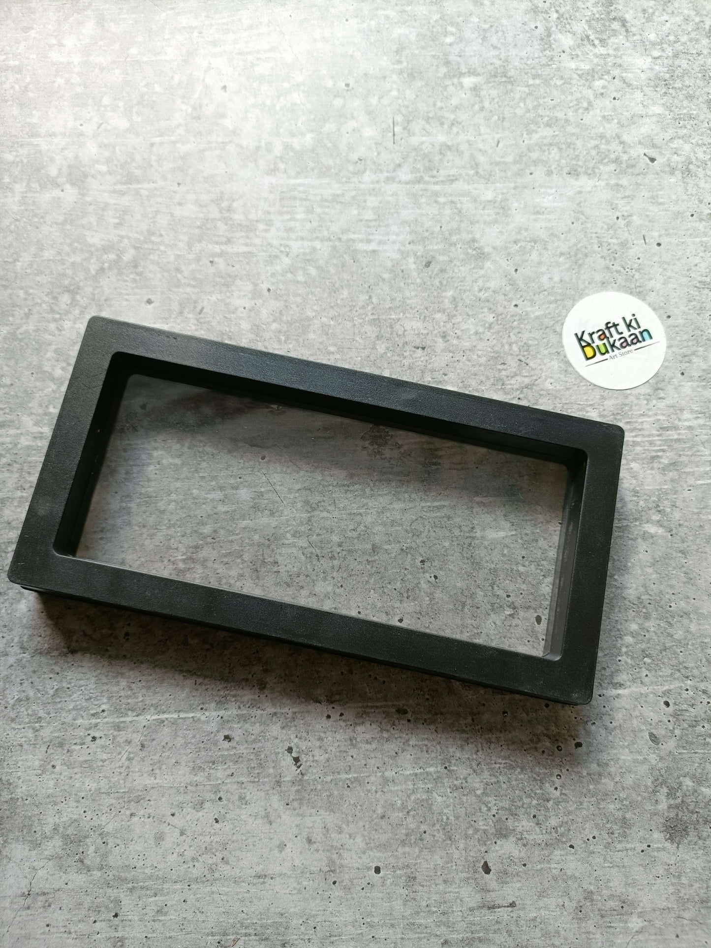 Black packing display box base frame with rectangular window opening, 18x9cm