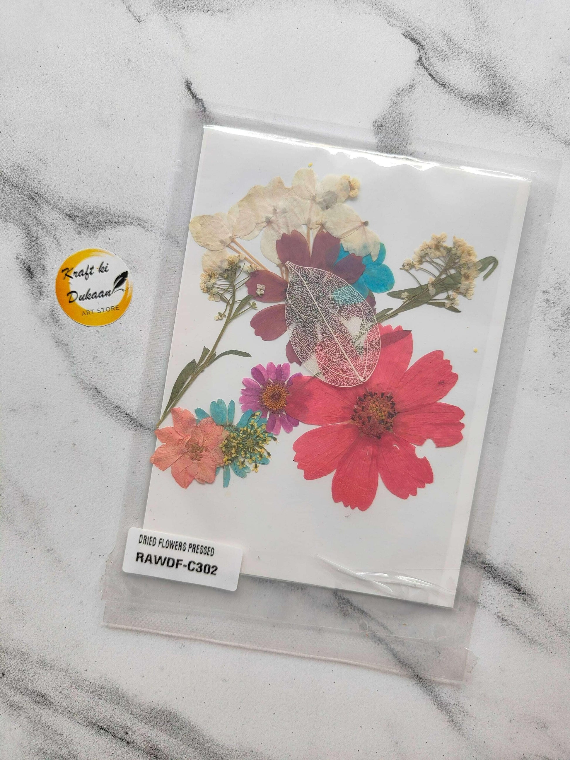 Pressed flower sheet mix F8 with layered pink, red, blue and purple pressed blossoms