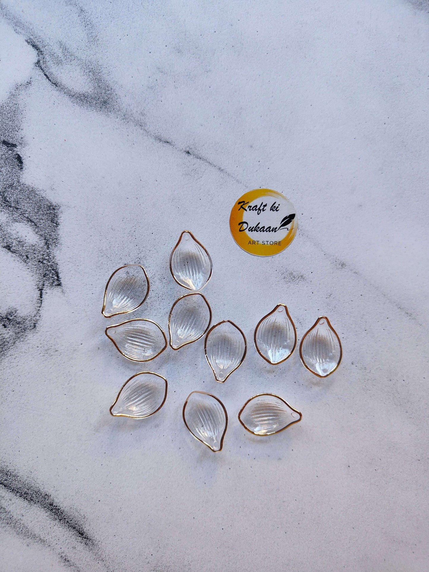 krafthikdukkaan-petal-beads-for-resin-art-clear-gold-edged-2