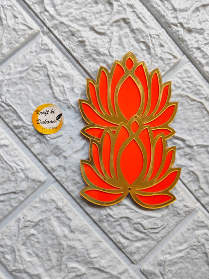 Acrylic lotus cutout with vibrant orange and gold design on textured white surface by Kraft ki Dukaan
