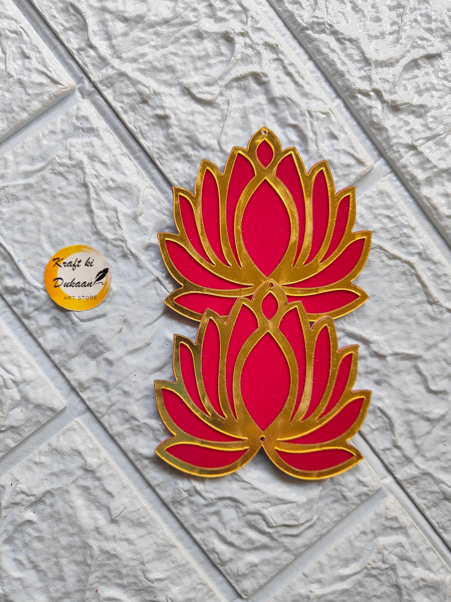 Red and gold acrylic lotus cutout decorative piece by Kraft ki Dukaan on textured background