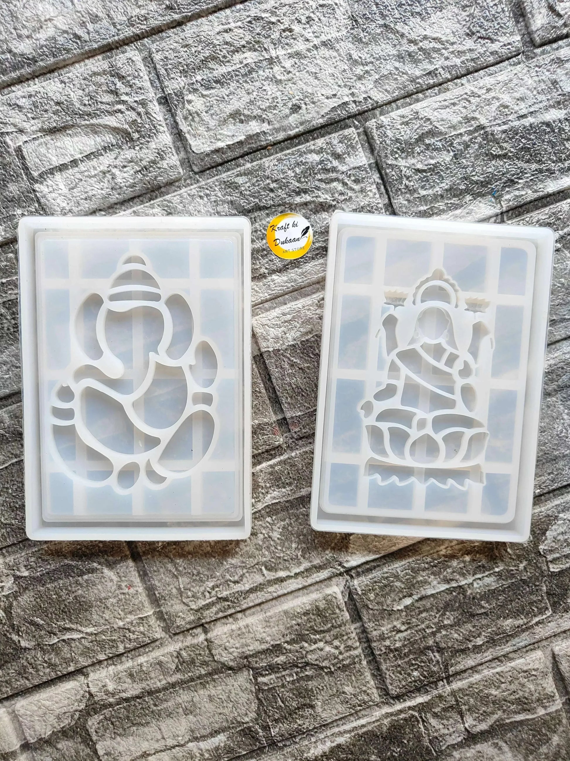 Ganpati frame mould with raised deity design on a clear rectangular insert