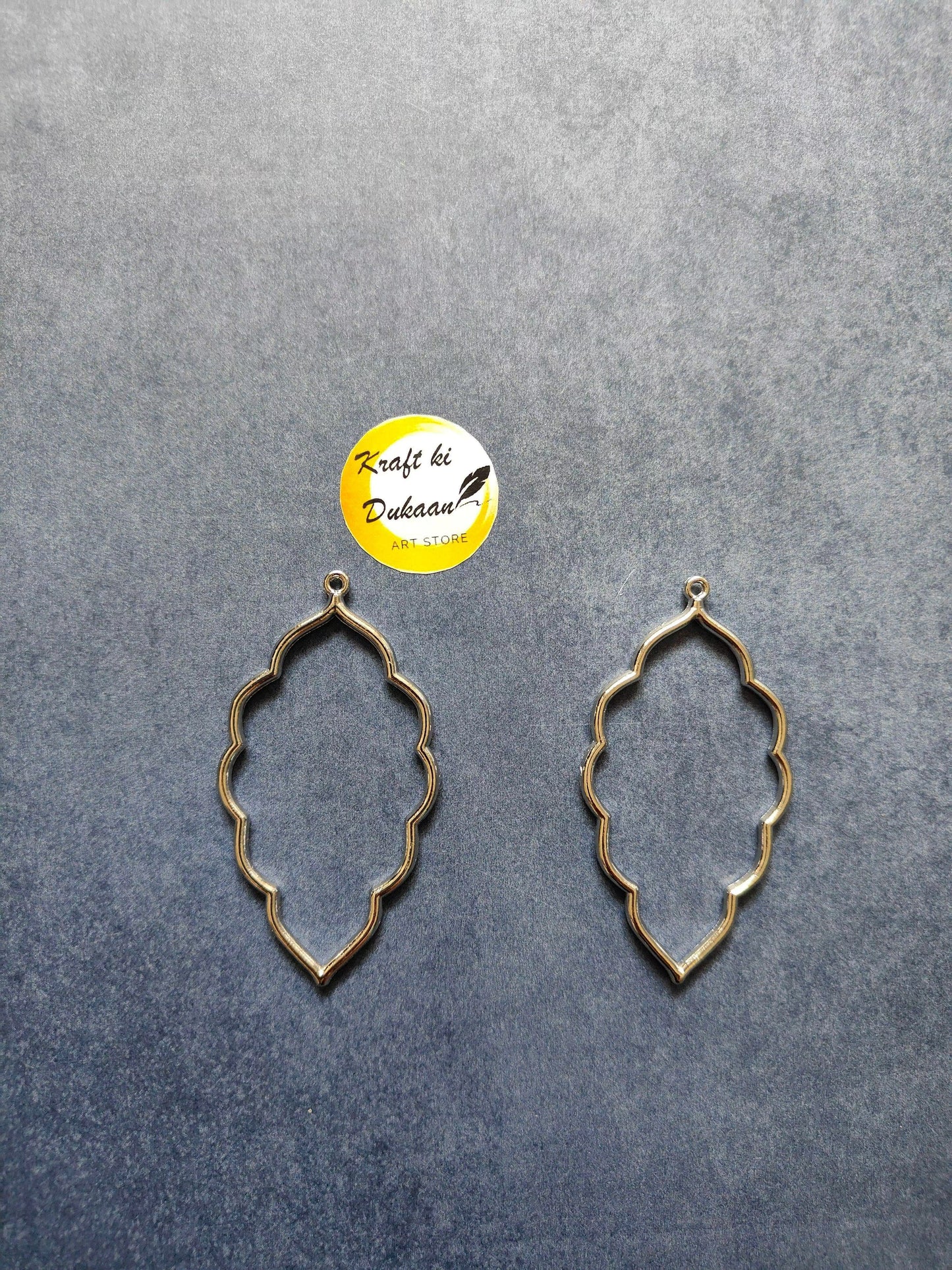 Leaf bezel pendant frames, gold-tone leaf outline (pair)
