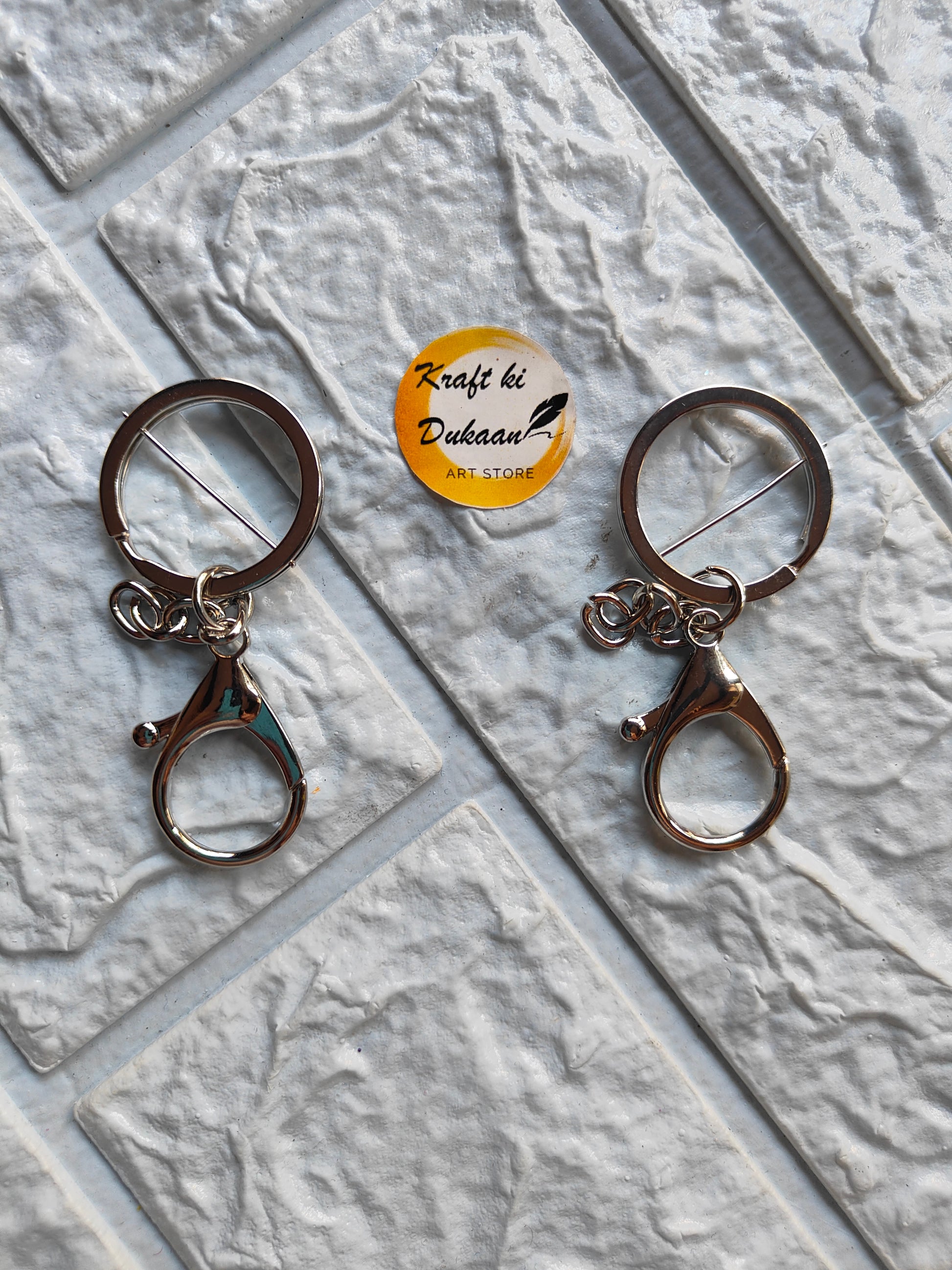 Gold lobster clasp keychain with smooth finish for easy attachment and detachment