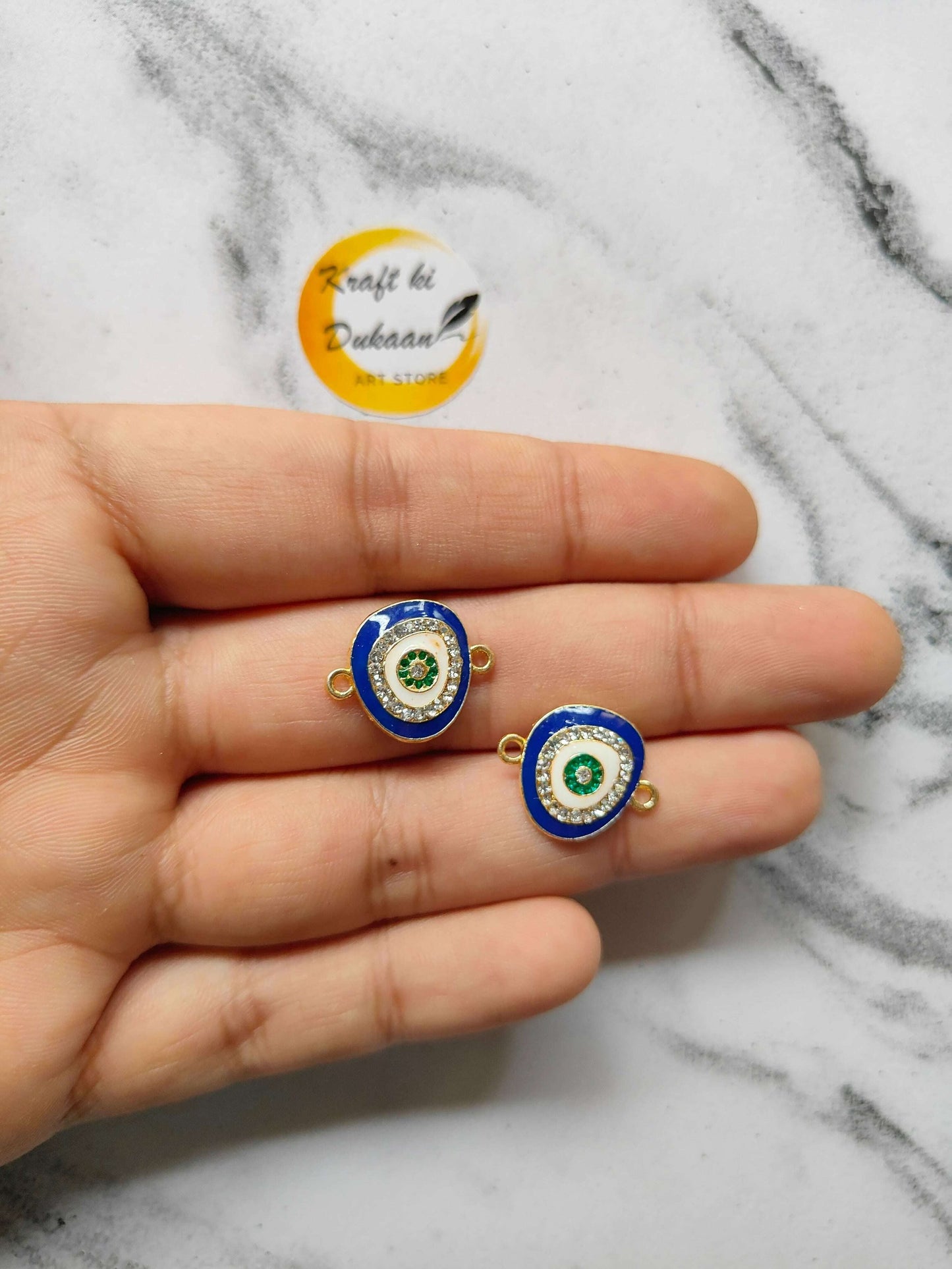 metal-charms-pendant-set-two-evil-eye-gold