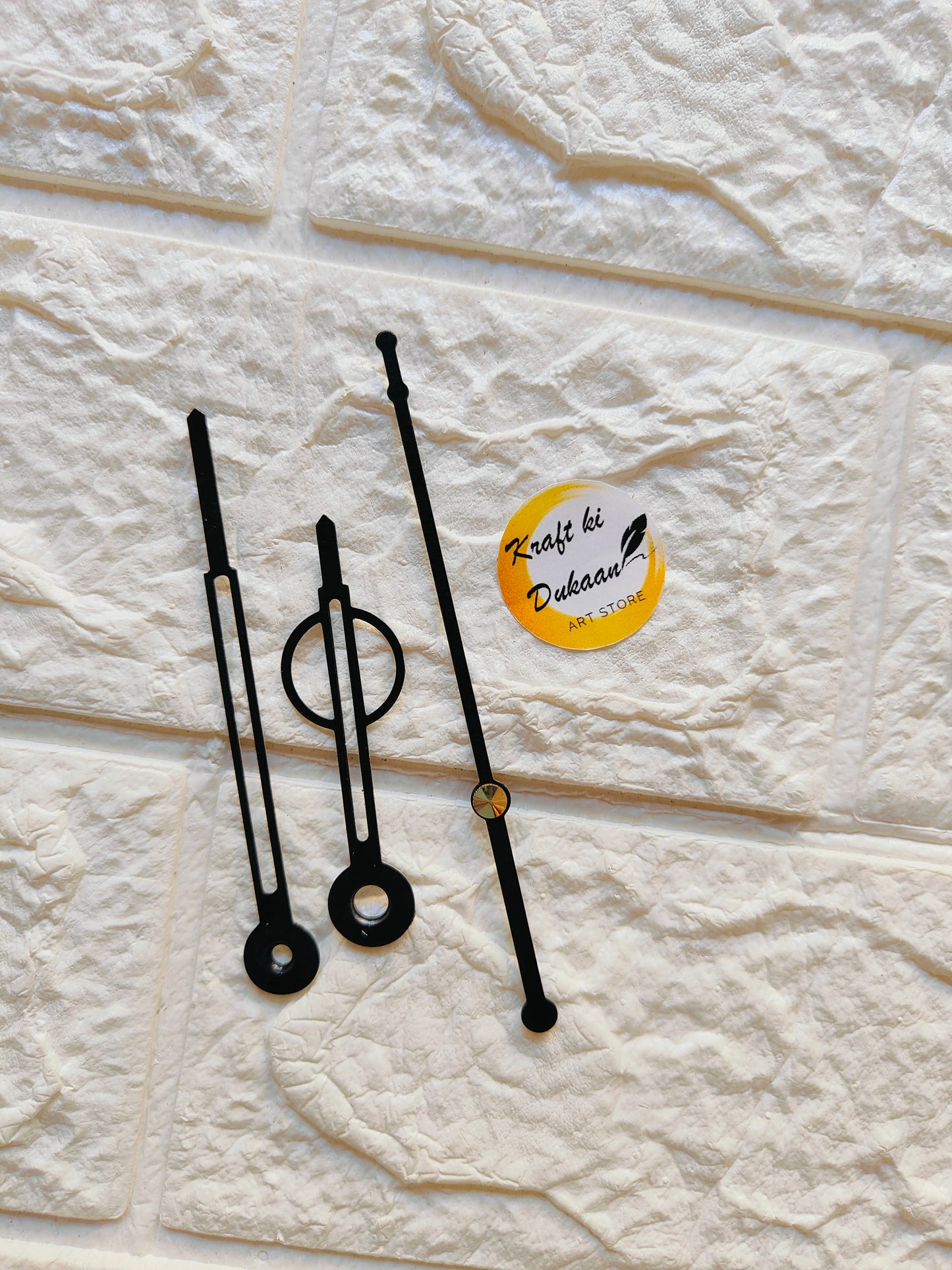 Set of metal clock hands for crafts in black, ideal for DIY projects and clock making