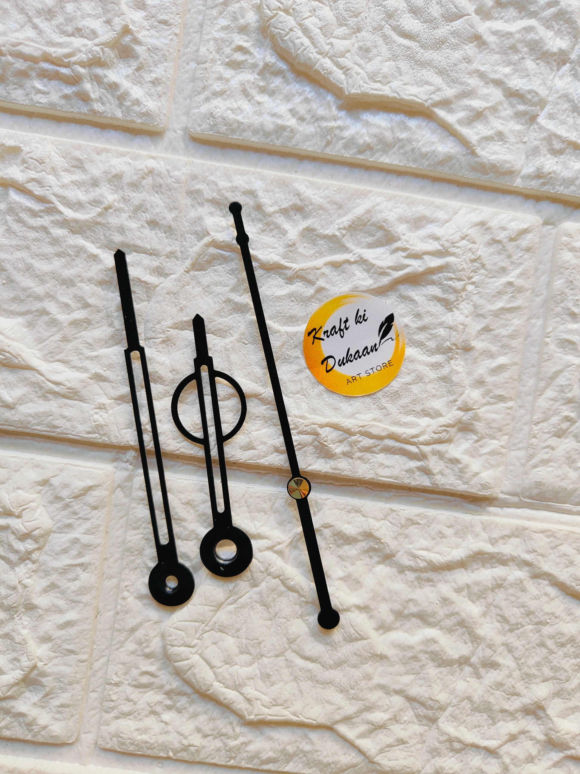 Set of metal clock hands for crafts in black, ideal for DIY projects and clock making