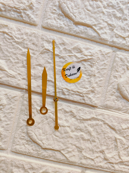Set of metal clock hands for crafts in gold, perfect for DIY clock-making projects