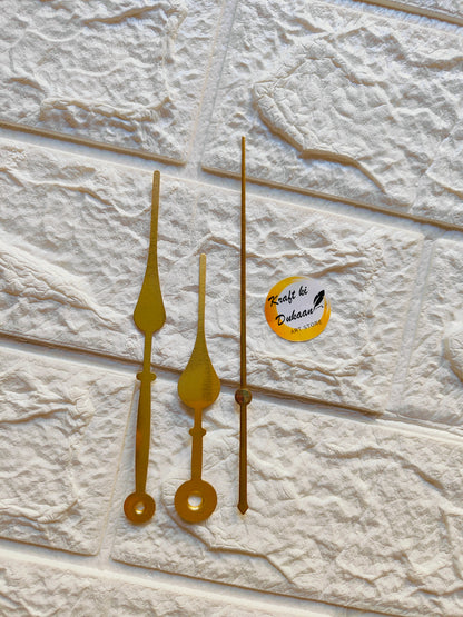 Set of yellow metal clock hands for crafts, perfect for DIY clock-making projects