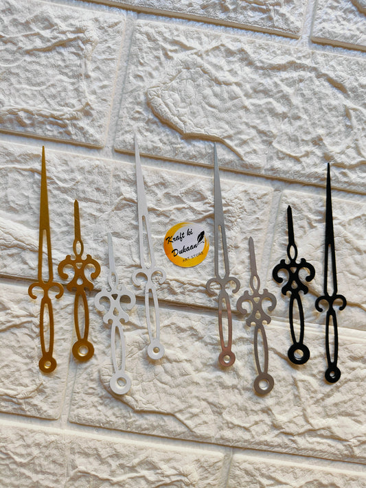 Variety of metal clock hands for crafts in gold, silver, and black for DIY projects