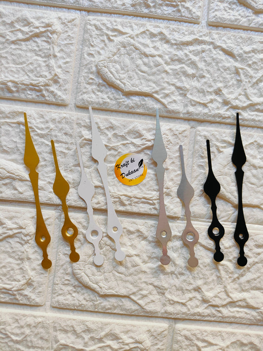 Set of metal clock hands for crafts in gold, silver, and black for DIY projects