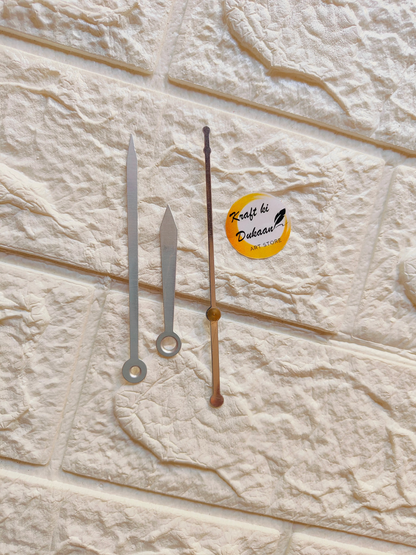 Three metal clock hands for crafts in silver and bronze for DIY projects and clock making