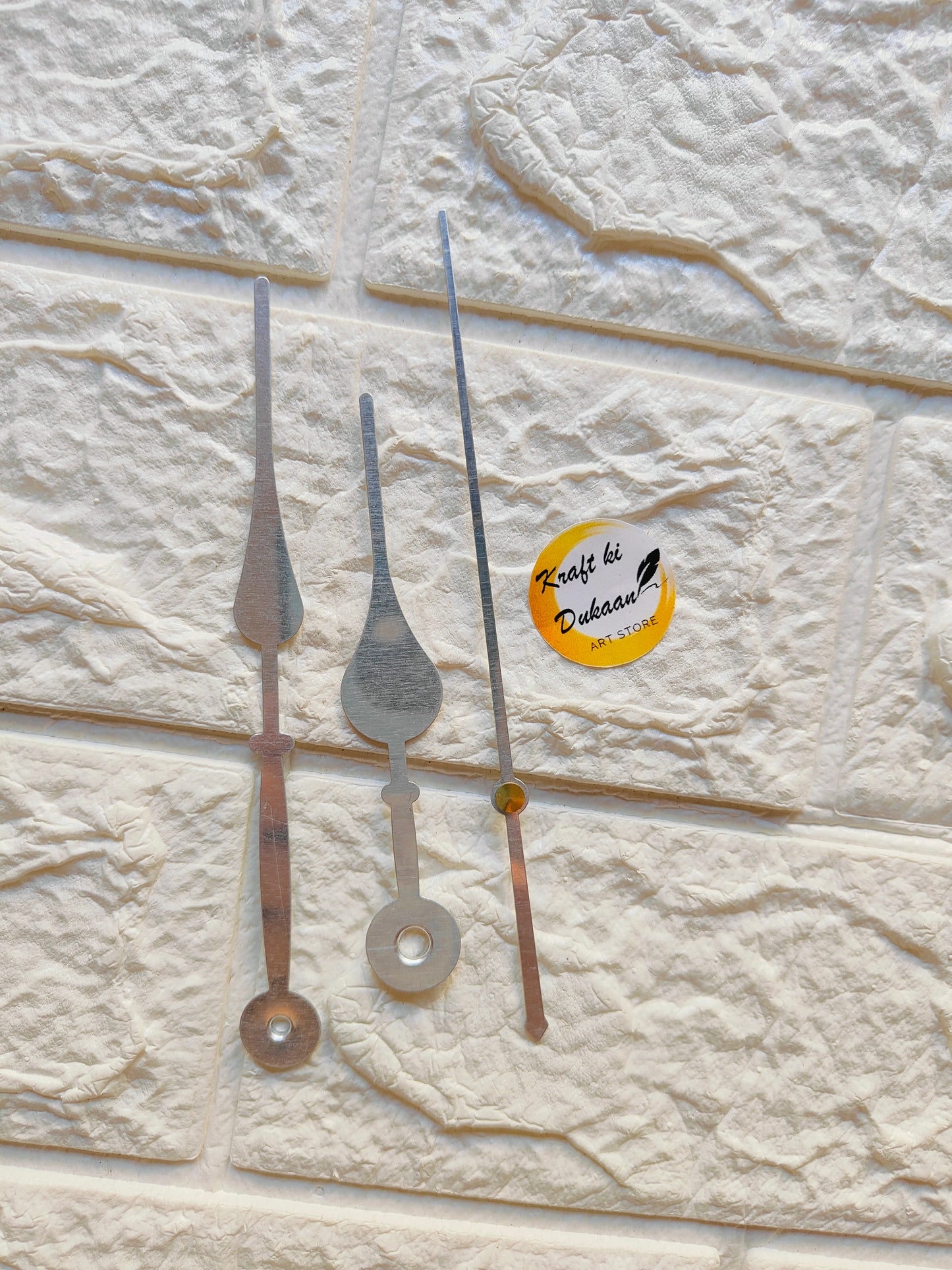 Set of metal clock hands for crafts in various shapes and sizes for projects