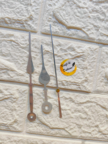 Set of metal clock hands for crafts in various shapes and sizes for projects