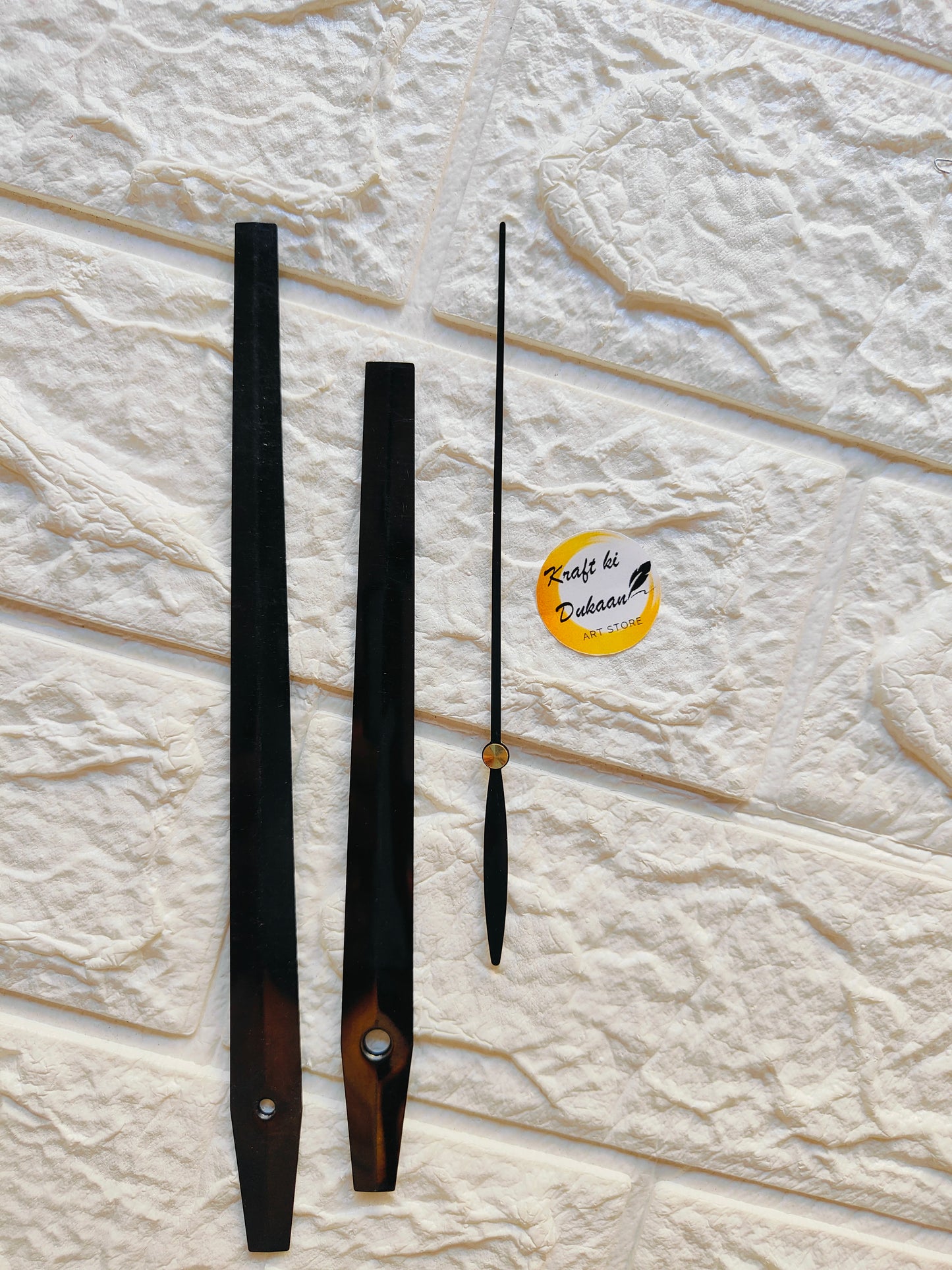 Set of metal clock hands for DIY projects in black and brown colors for custom clock making