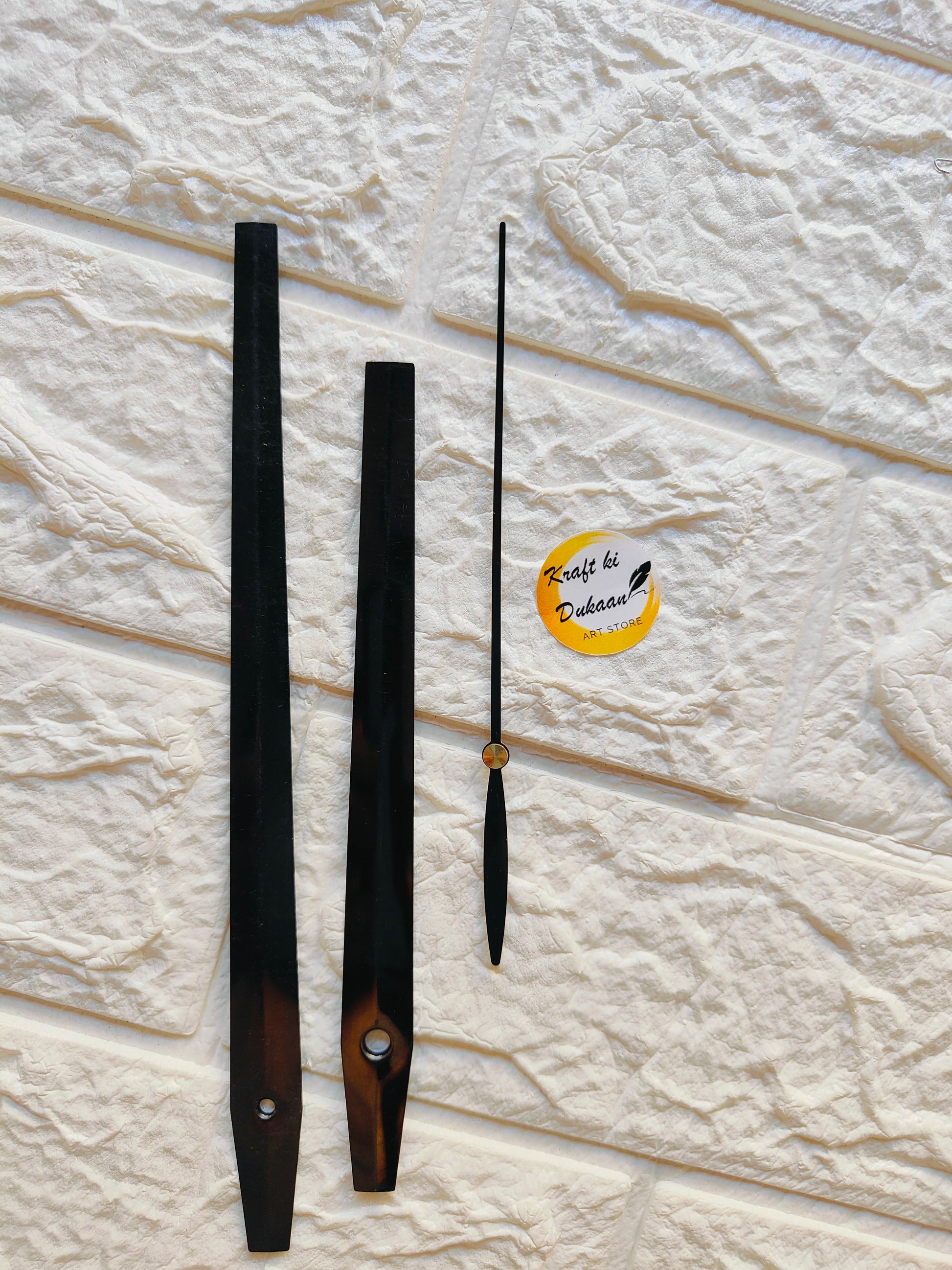 Set of metal clock hands for DIY projects in black and brown colors for custom clock making