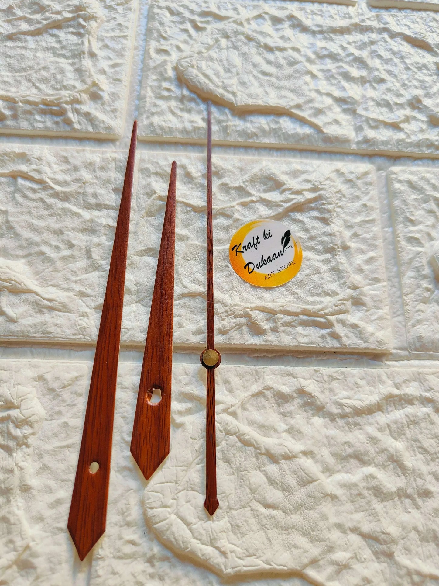 Clock hands W5: wooden minute and hour hands with metal second hand, angled.
