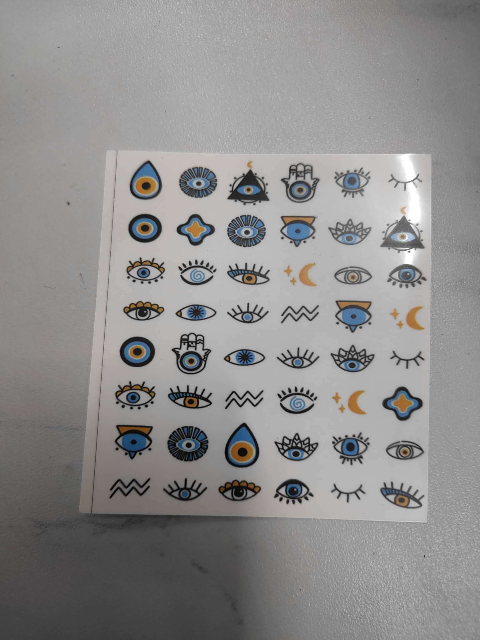 mini-sticker-sheet-for-keychains-blue-eyes-design