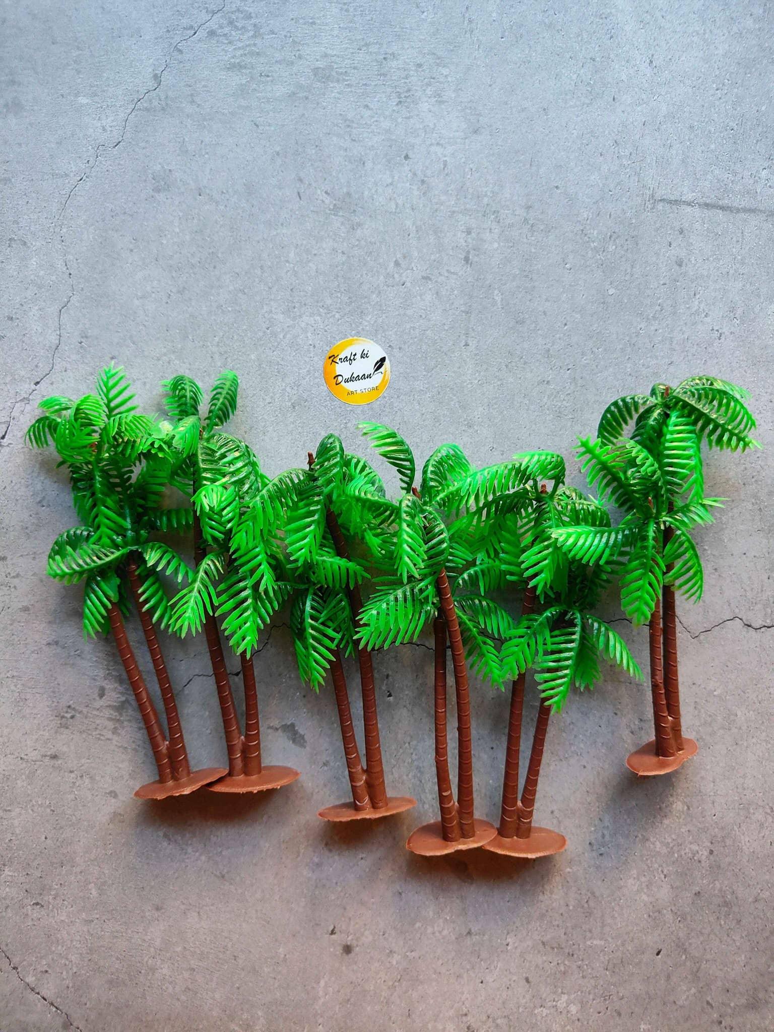Miniature Model A30: set of small green palm trees with brown trunks on circular bases