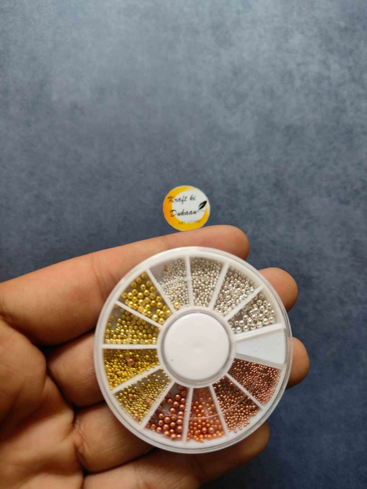 12-compartment nail art bead wheel: gold, white, bronze & pink microbeads