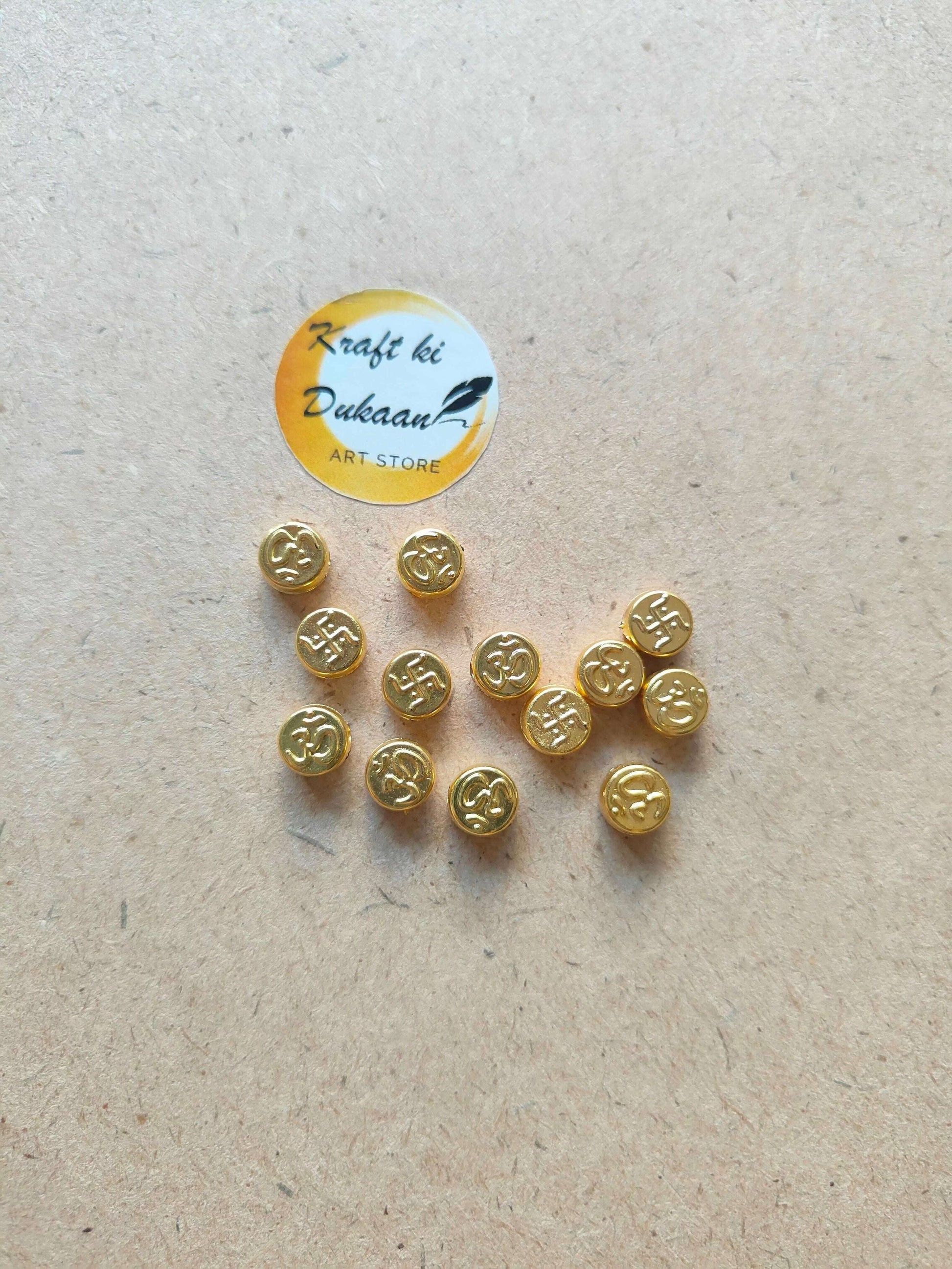 om-swastik-beads-for-jewelry-making-collection-on-paper