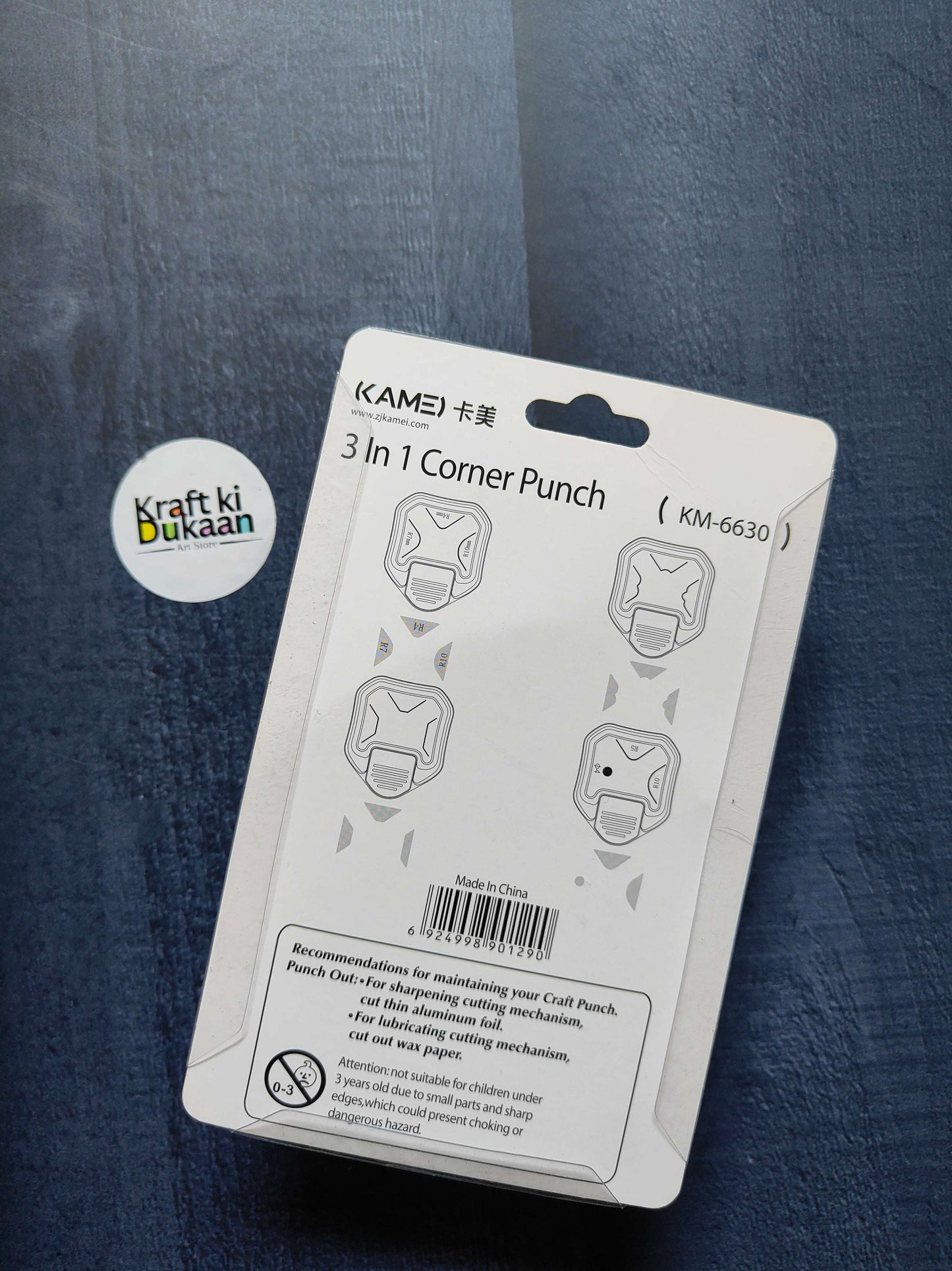 3 in 1 corner punch blister pack back, shows corner punch size icons and warnings