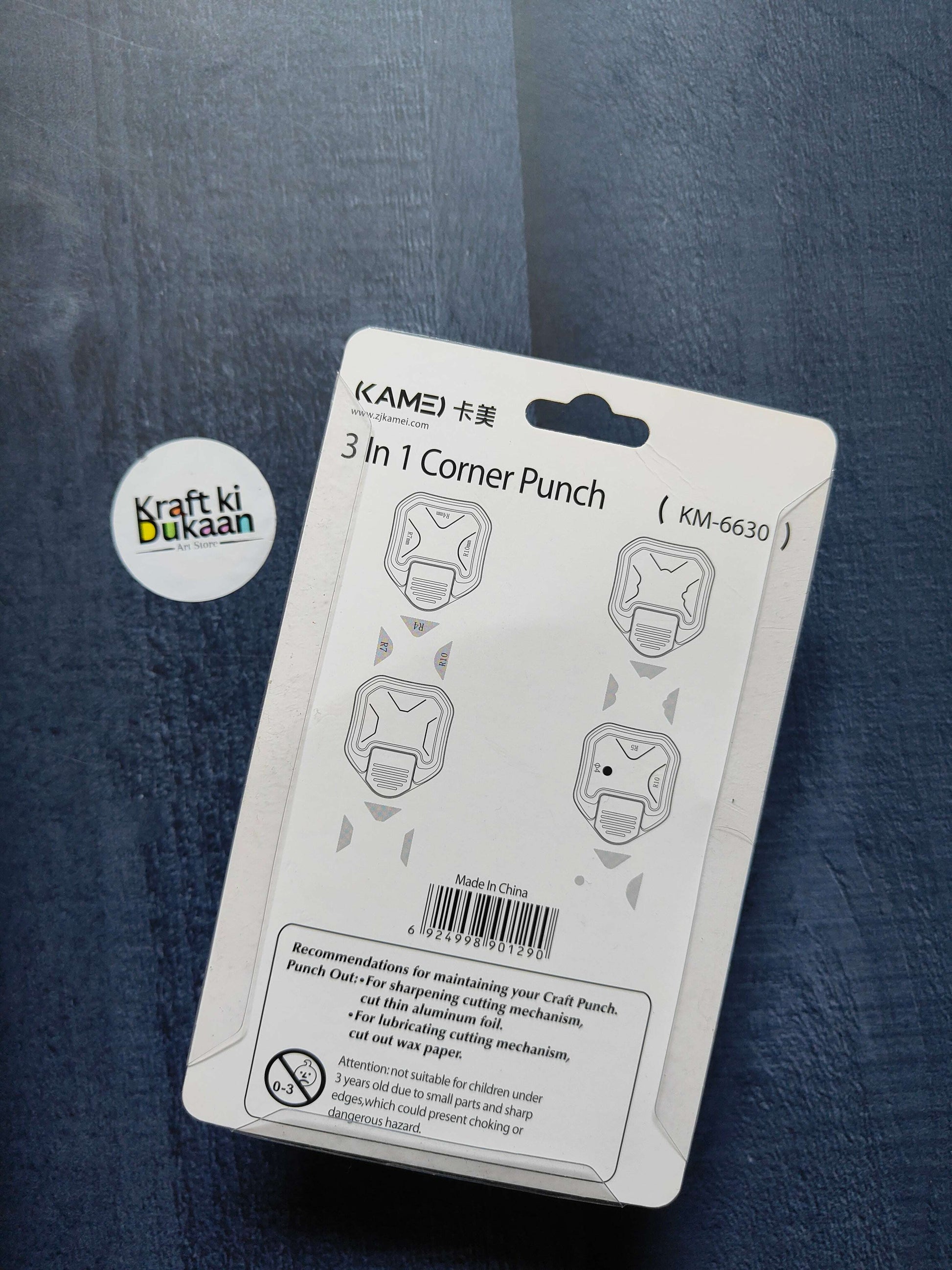 3 in 1 corner punch blister pack back, shows corner punch size icons and warnings