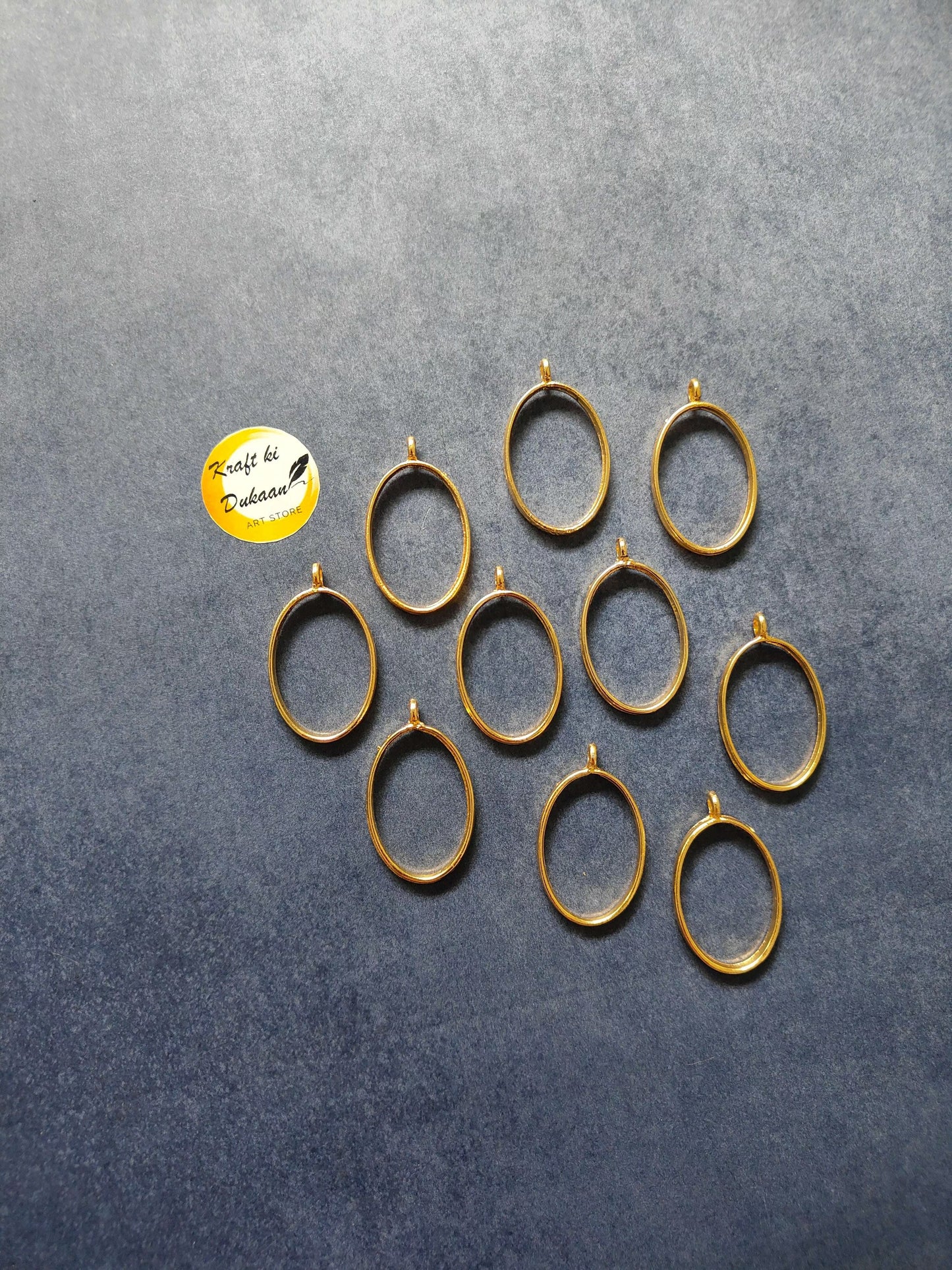 Gold oval bezel pendant frames set (10pc), each with small top loop