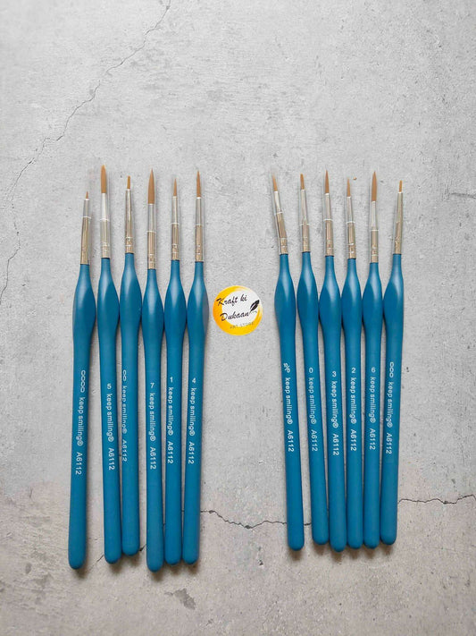Set of 12 miniature paint brushes with blue handles and gold ferrules