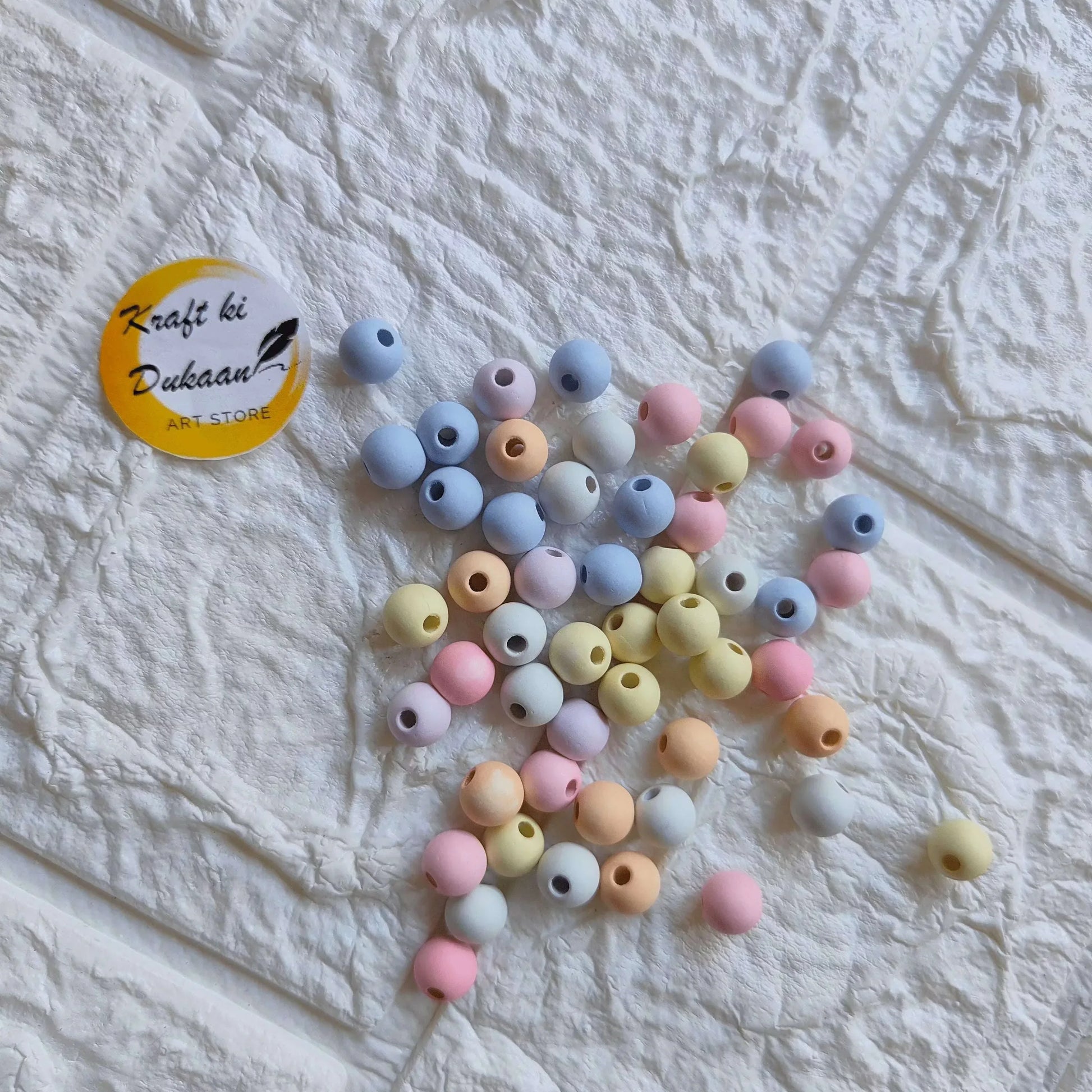Pastel multi-color pearl beads: small round matte beads in blue, pink, cream, yellow