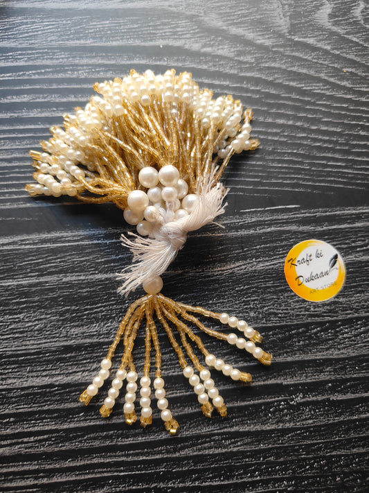 Elegant pearl resin latkan set in gold and white, perfect for enhancing traditional outfits