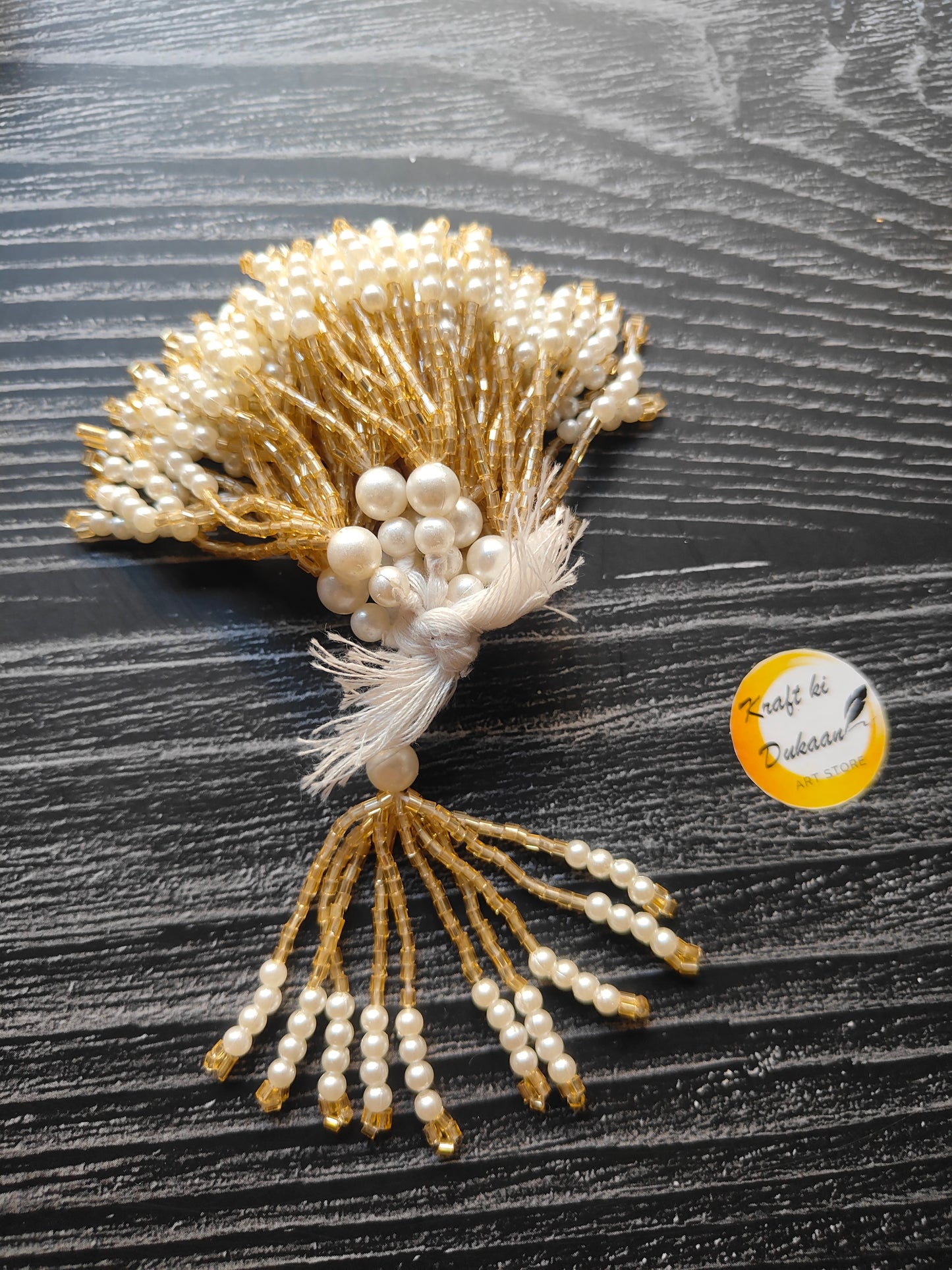 Elegant pearl resin latkan set with golden accents for enhancing traditional outfits