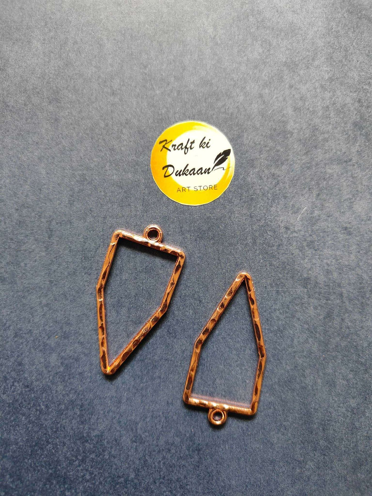 Pentagon bezel pendant pair in rose gold tone, open-back bezel with top loop