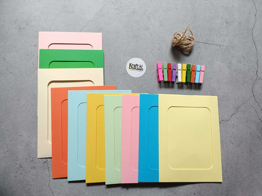 Hanging photo frame kit with colorful paper frames and hanging loop cutouts