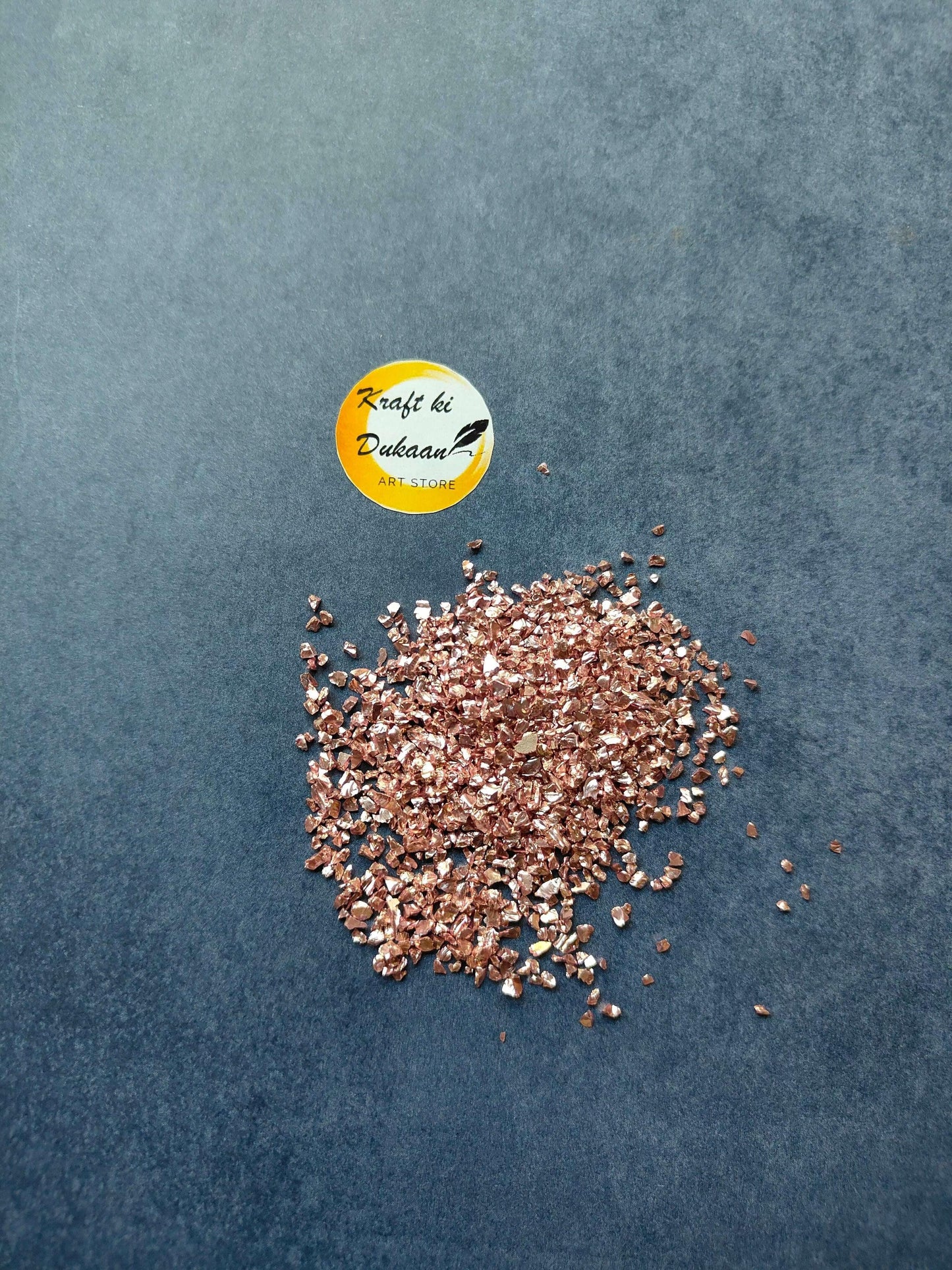 pink-stone-granules-for-resin-art-scattered-on-surface