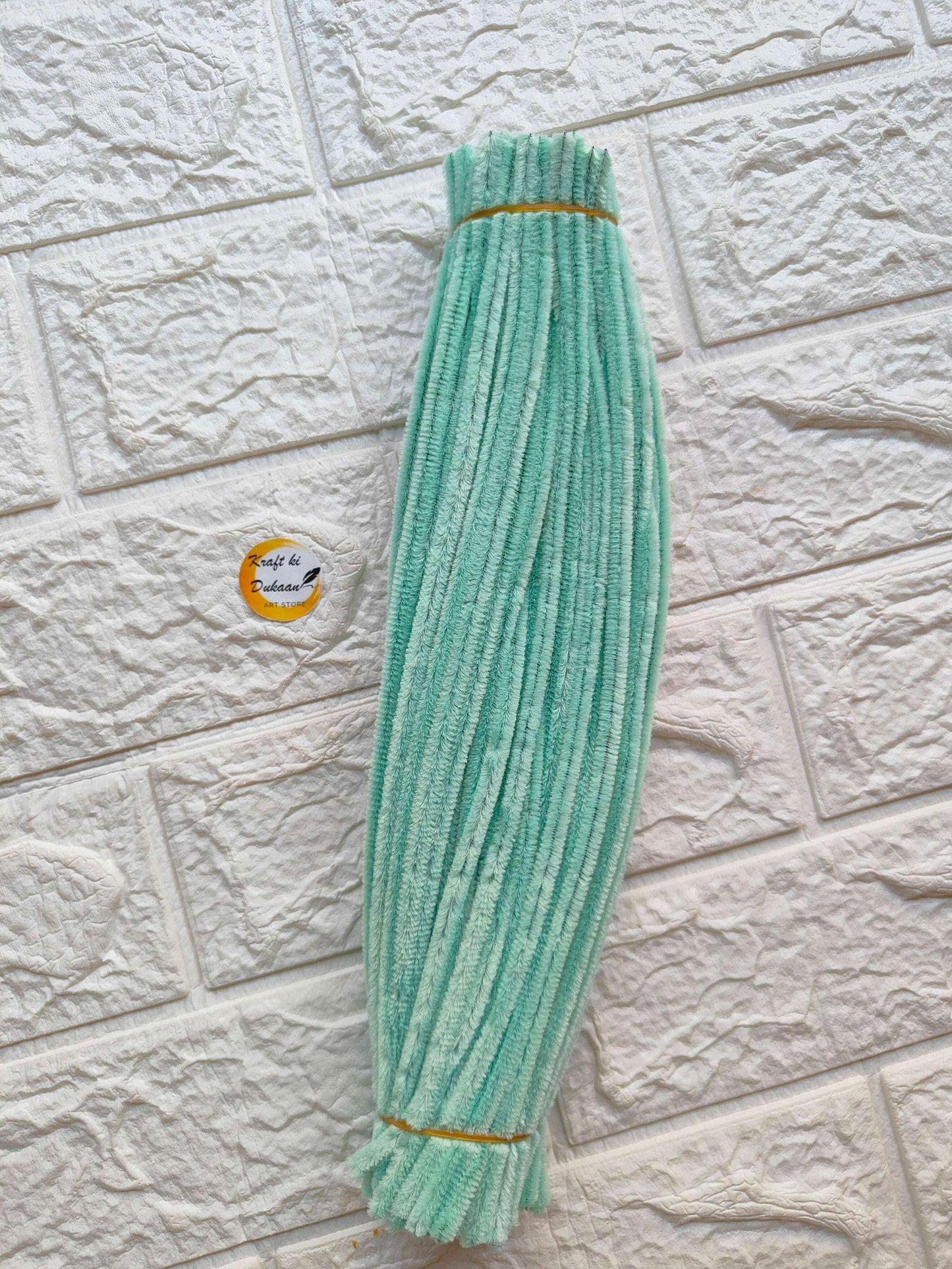 Pack of 50 plain pipe cleaners in mint green color, ideal for crafting and DIY projects