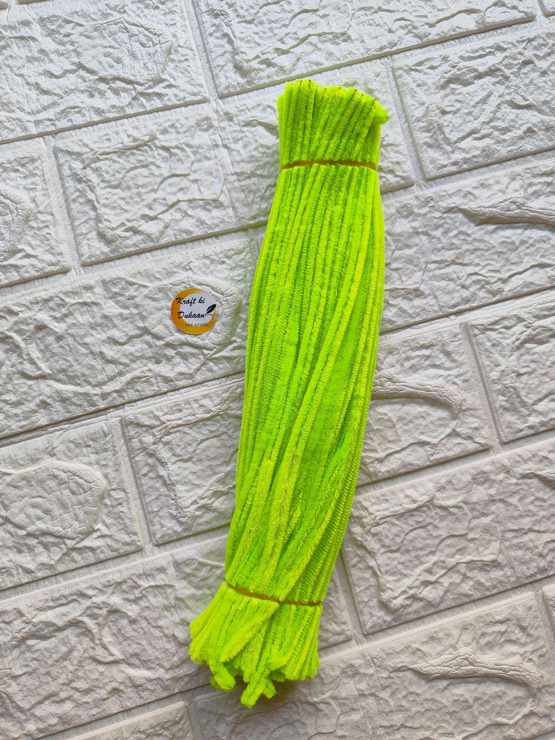 Pack of 100 plain pipe cleaners in neon yellow color, made of soft chenille for crafts and DIY projects