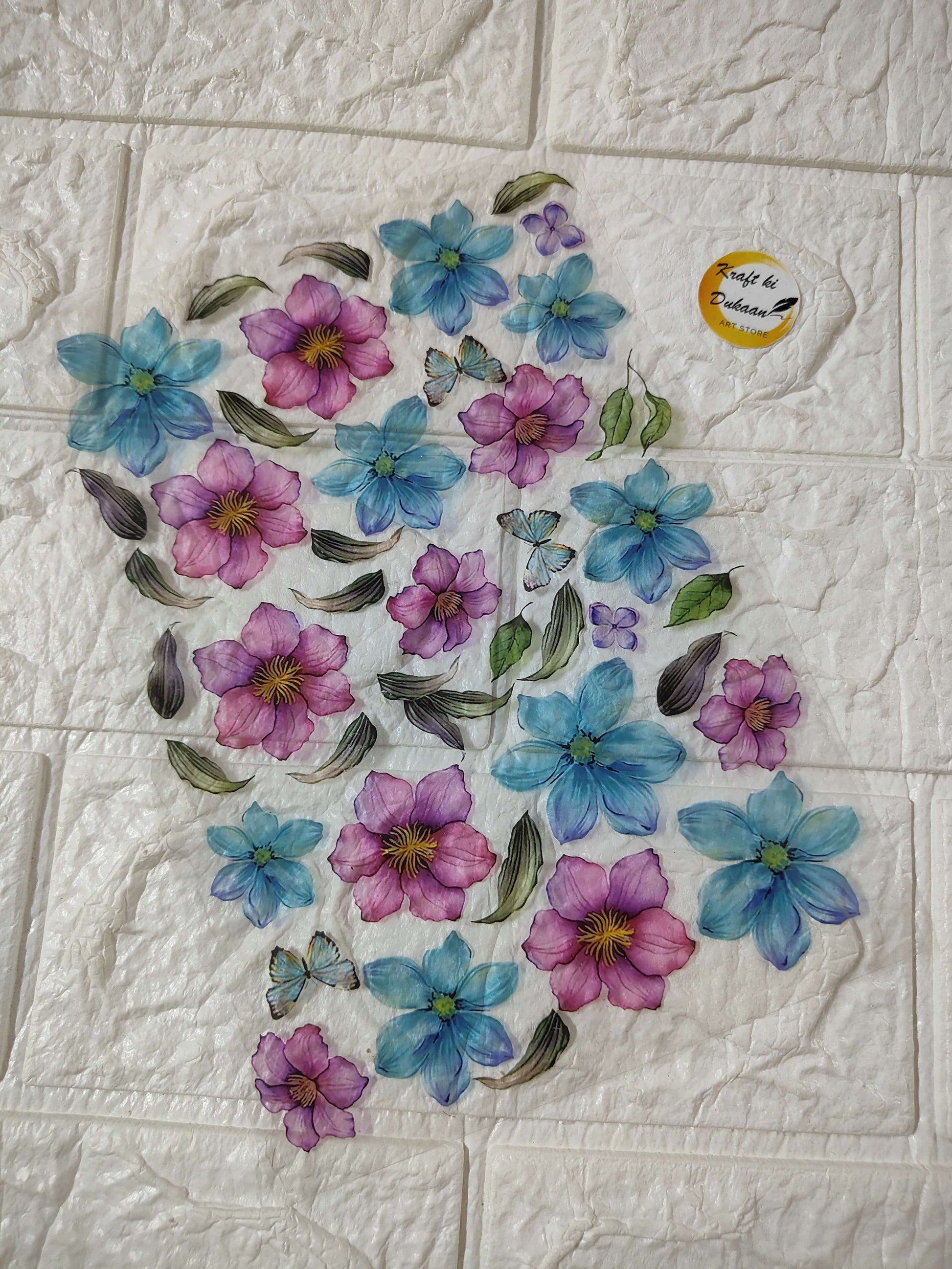 A5 insert sheet with purple and blue floral stickers and green leaves
