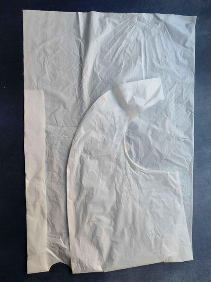 Plastic apron, white, sleeveless with curved neckline and front opening
