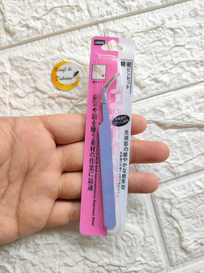 precision-craft-tweezers-light-blue-handheld